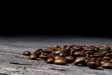 coffee grains on grunge wooden table