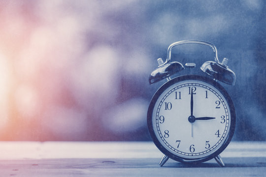 3 o'clock old retro clock blue vintage color tone with old grungy texture overlay - Powered by Adobe