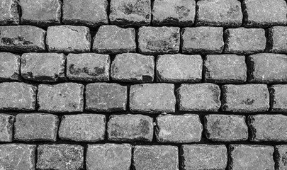 Road of massive stone blocks.