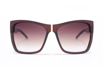 Sunglasses with brown wide frame isolated