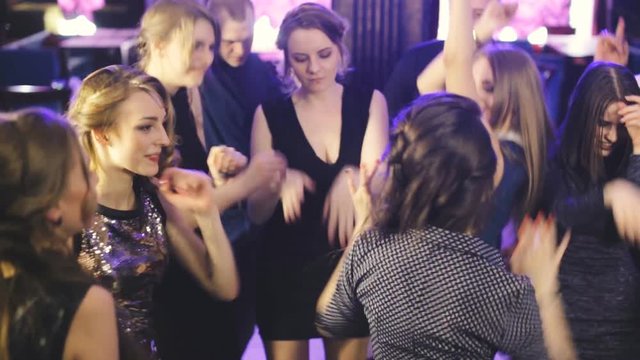 girl dances in a nightclub