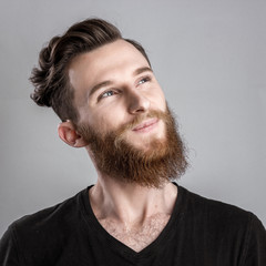 Obraz premium Happy dreaming young man