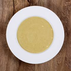 Vegetable soup on a wooden table