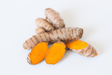Turmeric roots isolated on white background
