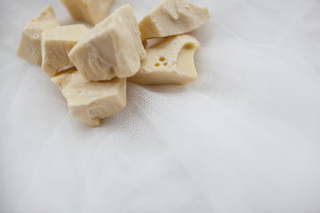 cocoa butter lying on white table