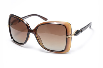 women's sunglasses with brown glass isolated on white