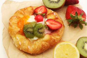 danish pastry with strawberry, kiwi and tangarine