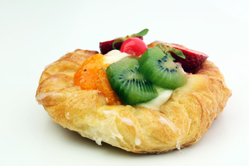 danish pastry with strawberry, kiwi and tangarine