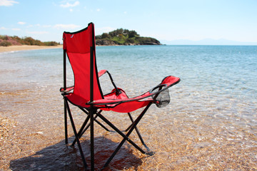 embty beach chair on the sea