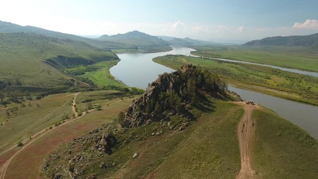 Selenga river Lion mountain flight above helicopter drone. Near Ulan-Ude best Russian nature panorama open space. Forward move cinematic. Sunny day.