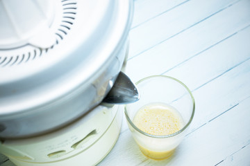 Part of the juicer on a light background