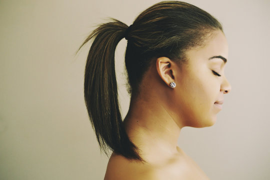 Profile of Mixed Race woman with eyes closed