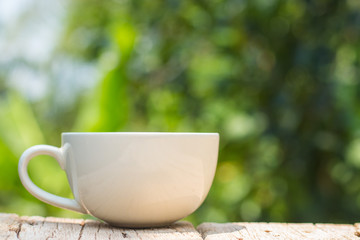 A cup of coffee on a wooden