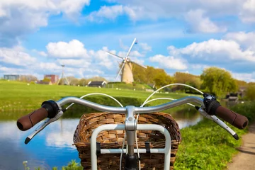 Fotobehang Bicycle and windmill. Symbols of the Netherlands. © Vitalinka