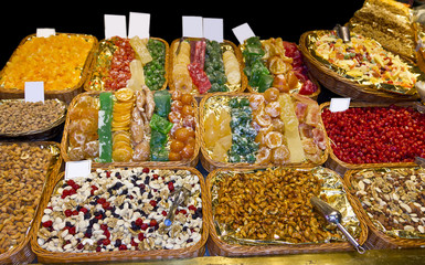 Sweets, candies and dried fruits in La Boqueria (Barcelona famous market)