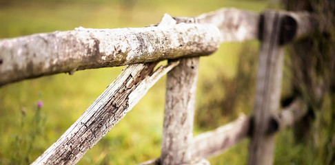 Farming concept - website banner of a rustic wooden fence