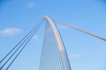 The Samuel Beckett Bridge crosses the Liffey River in Dublin. The structure, designed with a cable-stay method of suspension, is said to resemble an Irish harp.
