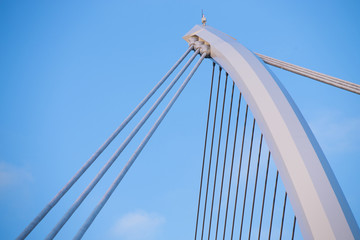 The Samuel Beckett Bridge crosses the Liffey River in Dublin. The structure, designed with a cable-stay method of suspension, is said to resemble an Irish harp.