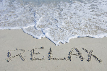 Fototapeta premium Relax Written in the Sand