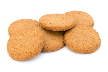 Stacked short pastry cookies isolated on white background.