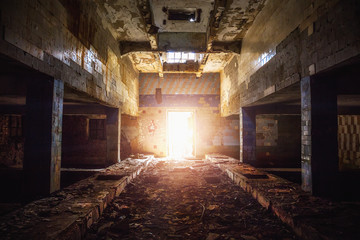 Fototapeta na wymiar Corridor in abandoned factory building