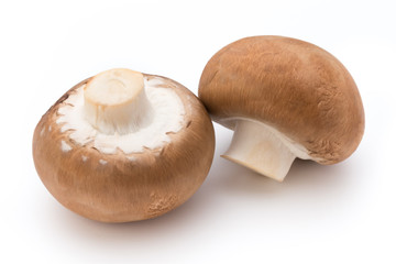 Fresh champignon mushrooms isolated on white.