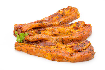 Spicy marinated spare ribs barbecued on the white background.