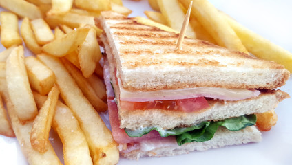 Club sandwich with french fries