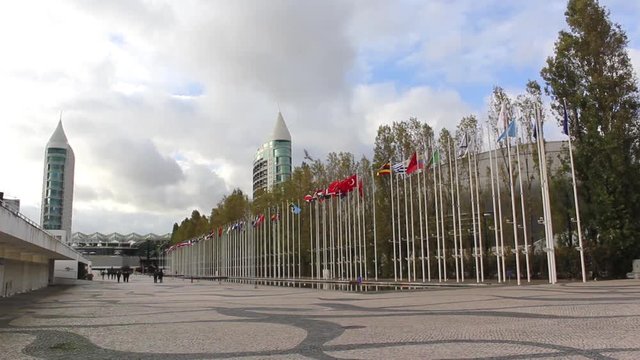 Flags of all nations and big modern building in Parque das Na&ccedil;&otilde;es, Lisboa