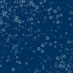 Fototapeta na wymiar Soap bubbles. Scatter pattern with soap bubbles on deep blue background. Vector illustration.