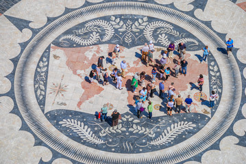 Aerial view of the world map mosaic with people standing in the middle, Lisbon, Portugal