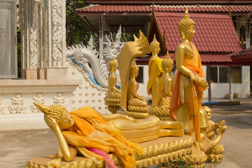 Fototapeta premium Row of golden buddha statue in Wat Mai Kham Wan temple, Phichit,Thailand.