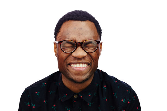attractive young black male studio laughing with eyes closed