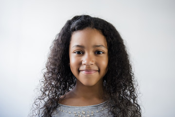Portrait of smiling Mixed Race girl