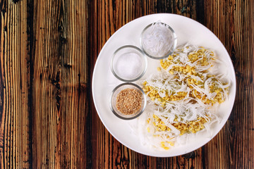 Streamed mung bean topped roll coconut .