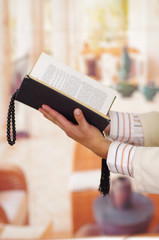 Adult Muslim Man Is Reading The Koran