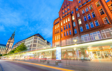Fototapeta na wymiar HAMBURG, GERMANY - JULY 20, 2016: City streets at night. Hamburg attracts more than 10 million tourists annually