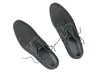 A pair of classic men's shoes isolated on white background top view.