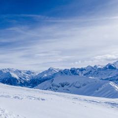 mountain in winter, covered of snow.  turns in a sunny day