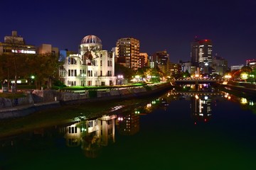 Fototapeta na wymiar Beautiful Scenery of Hiroshima City and the Atomic Bomb Dome Reflecting the River at Night
