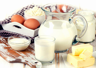 Fresh Milk products on  a  wooden background.