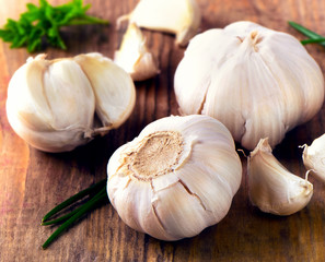 Fresh Organic garlic  on  old wooden background.
