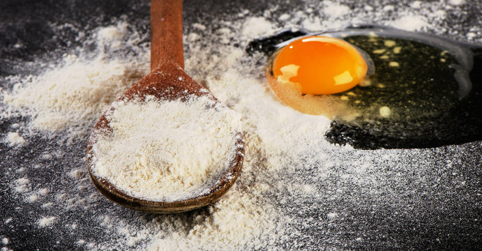 Baking ingredients with a egg  and flour.
