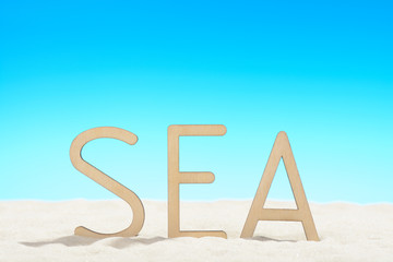 The word SEA on the beach