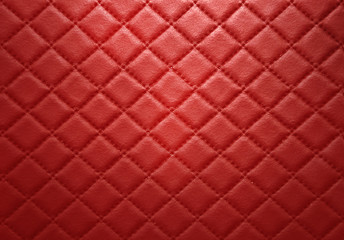 Red leather texture with seam background