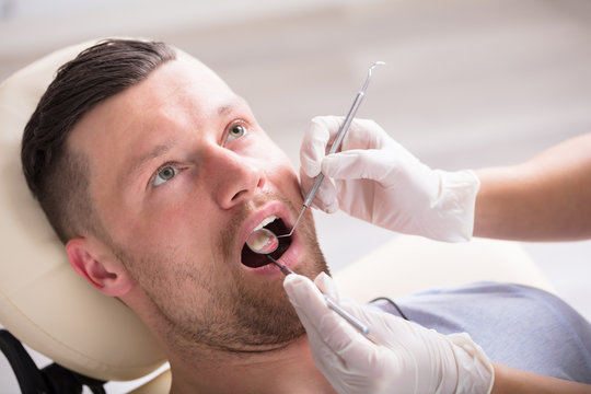 Young Man Having His Dental Checkup