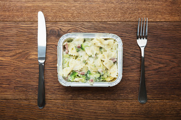 Ready Pasts Meal In Foil Container On The Table
