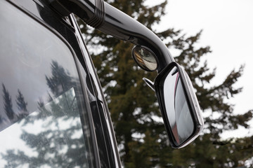 Rear view mirror with modern bus