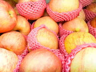 Group of fresh red apples in the market