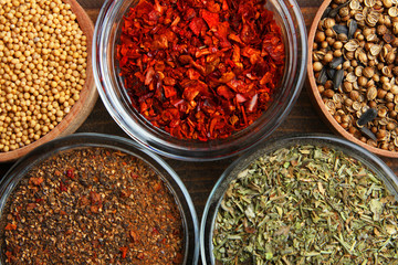 Different spices in bowls close-up